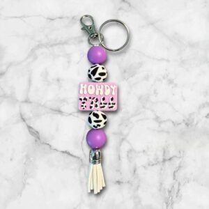 howdy-yall-purple-cowprint-silicone-keychain-backpack-or-purse-dangle